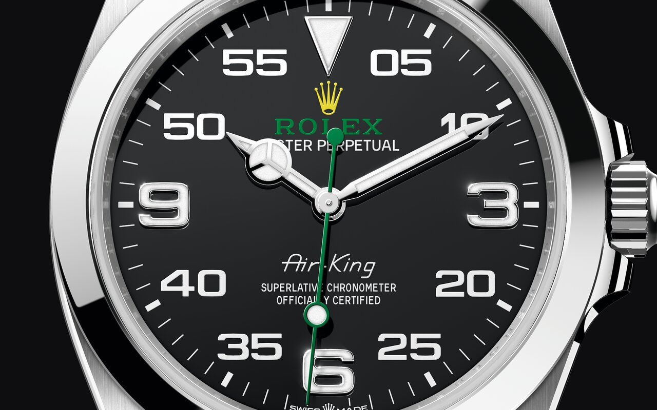 Gros plan du cadran noir d'une Rolex Air-King 126900, chiffres 3, 6 et 9 appliqués, échelle des minutes de 05 à 55 et trotteuse verte